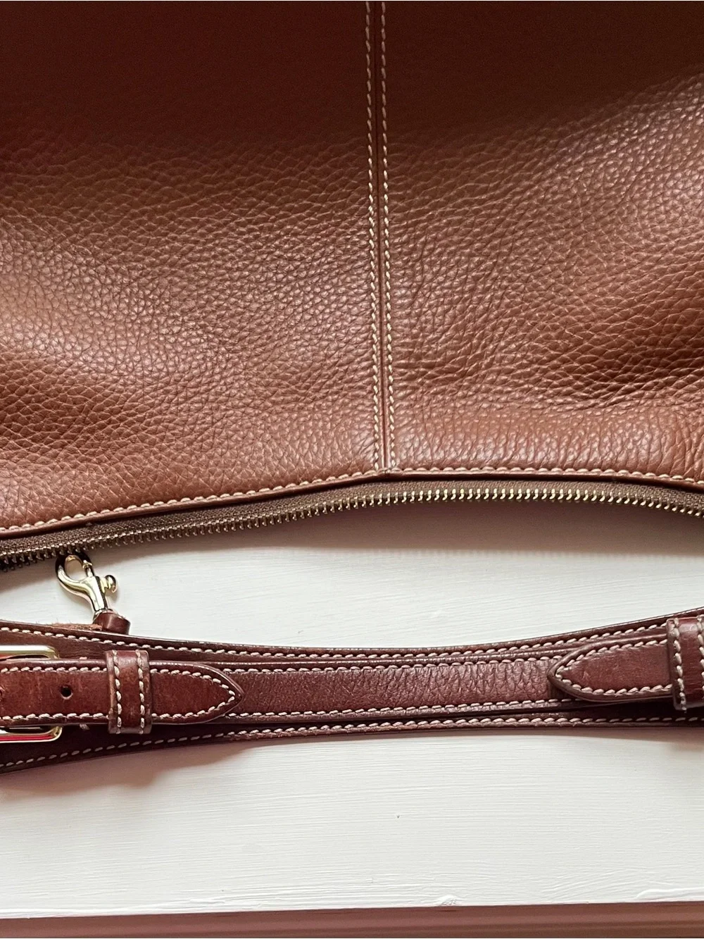 Dooney & Bourke Dark Brown Leather Messenger Bag with Brass Accents
